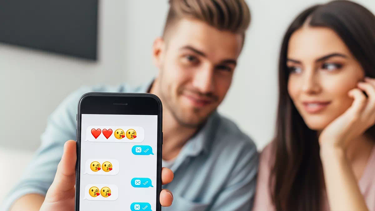 Guy Showing his Phone where he is Flirting with a Woman in a Chat App